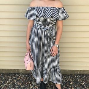 Off shoulder, ankle length dress.